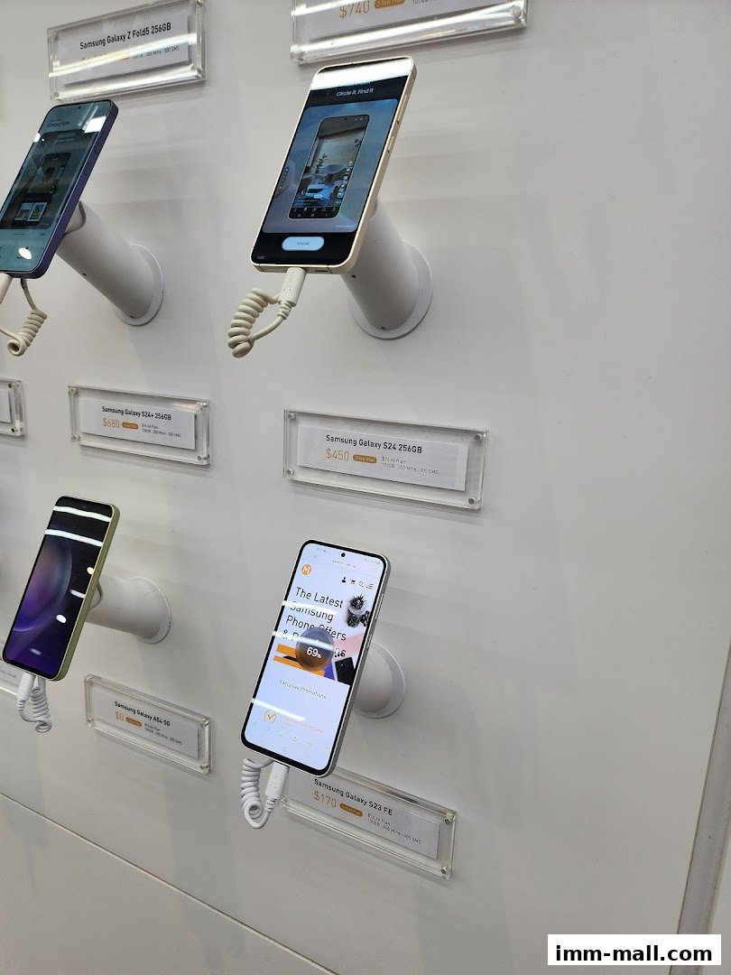 Display of various Samsung smartphones with price tags and promotional information.