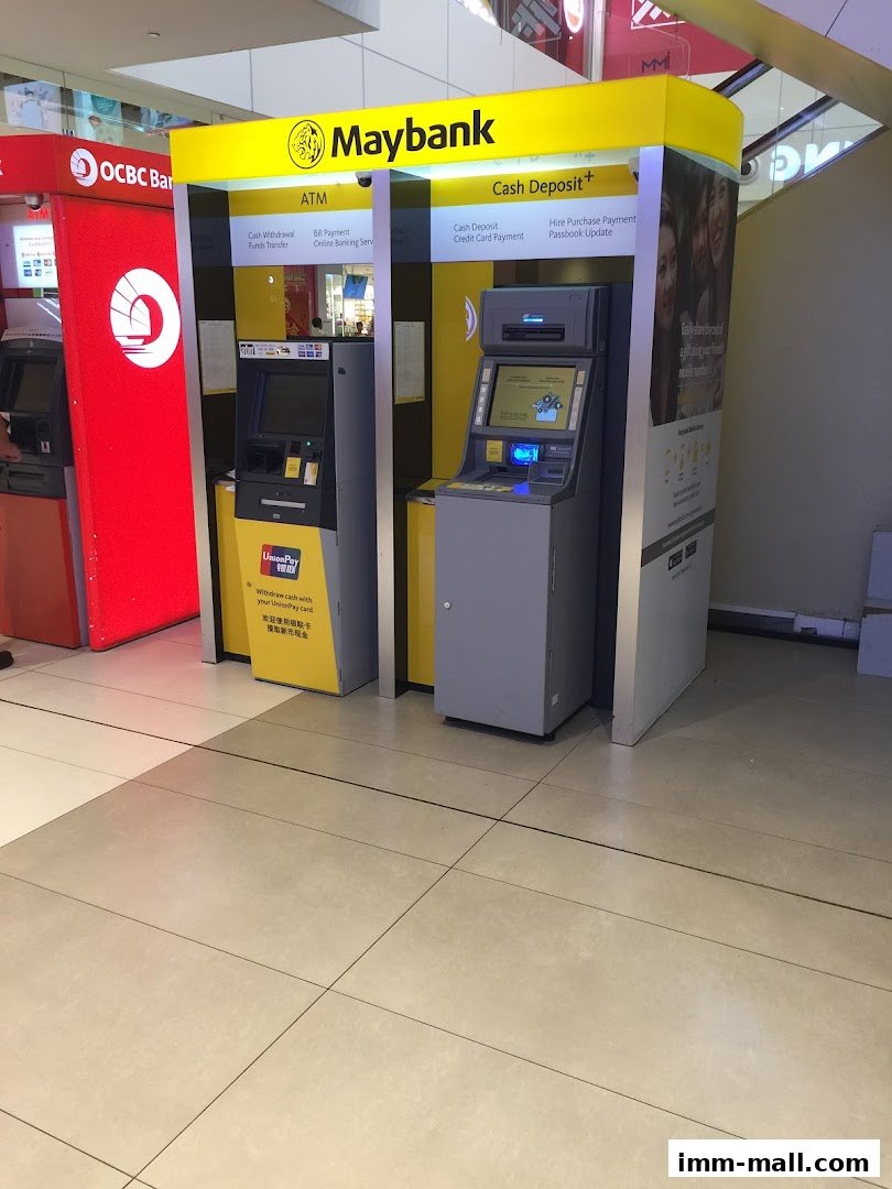 Maybank ATM and cash deposit machines are located next to OCBC Bank machines.