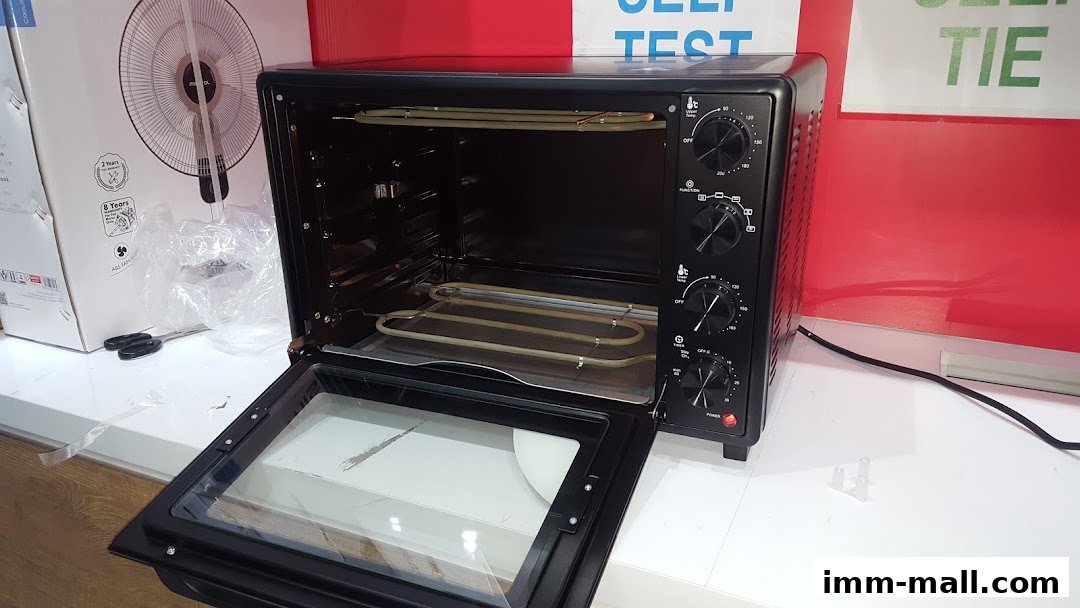 A black oven with its door open, showcasing heating elements and controls.