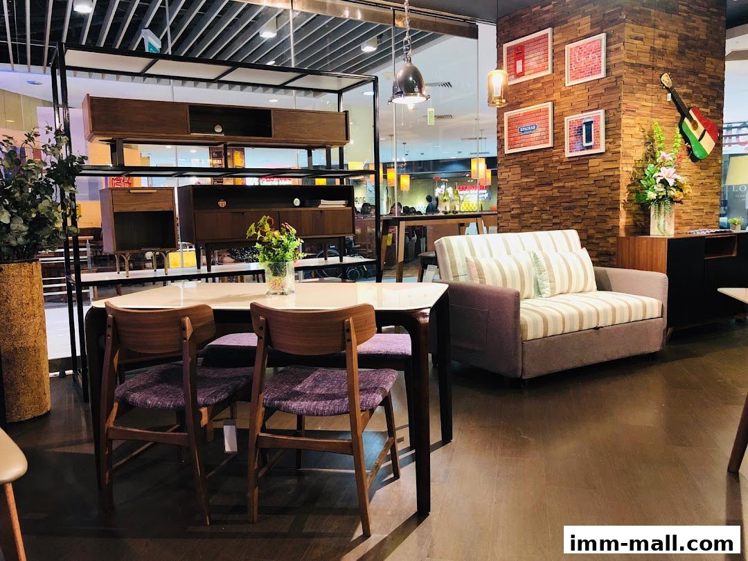 A modern furniture store interior featuring a dining set and a sofa.