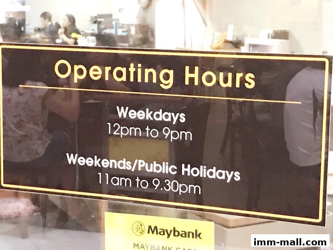 A sign displaying the operating hours for Mondi, open weekdays and weekends.