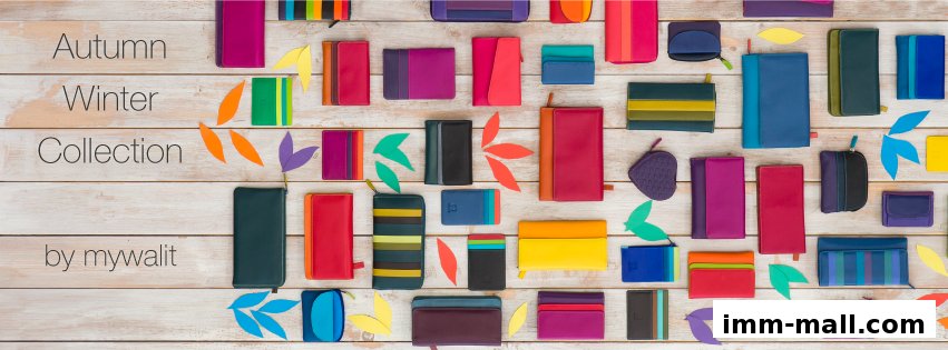 A vibrant collection of Mywalit wallets and accessories displayed on a wooden background.