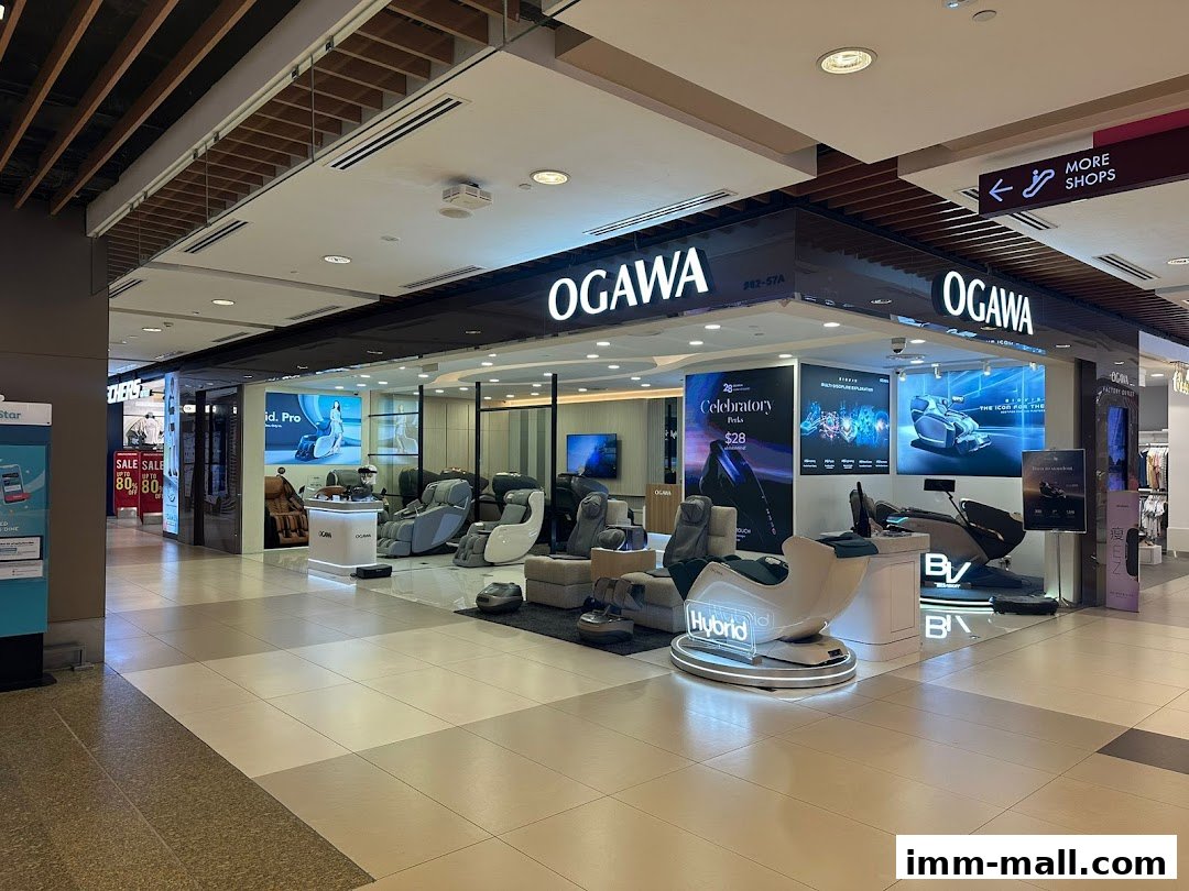 OGAWA shop front displaying various massage chairs and promotional screens.