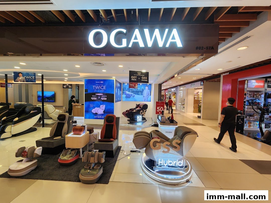 OGAWA massage chairs displayed in a well-lit retail store with promotional banners.