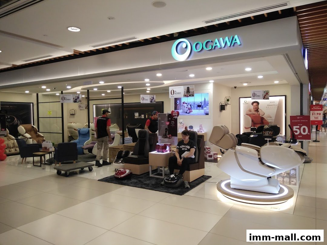 OGAWA store interior showcasing various massage chairs and promotional displays.