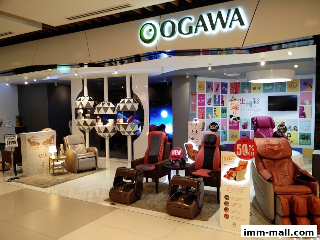 OGAWA massage chairs and foot massagers displayed in a modern retail store.