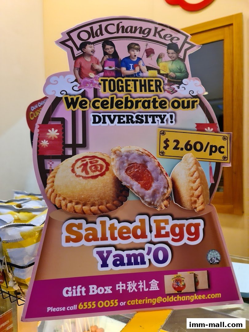 A sign advertising Old Chang Kee's Salted Egg Yam'O pastry, priced at $2.60 per piece.