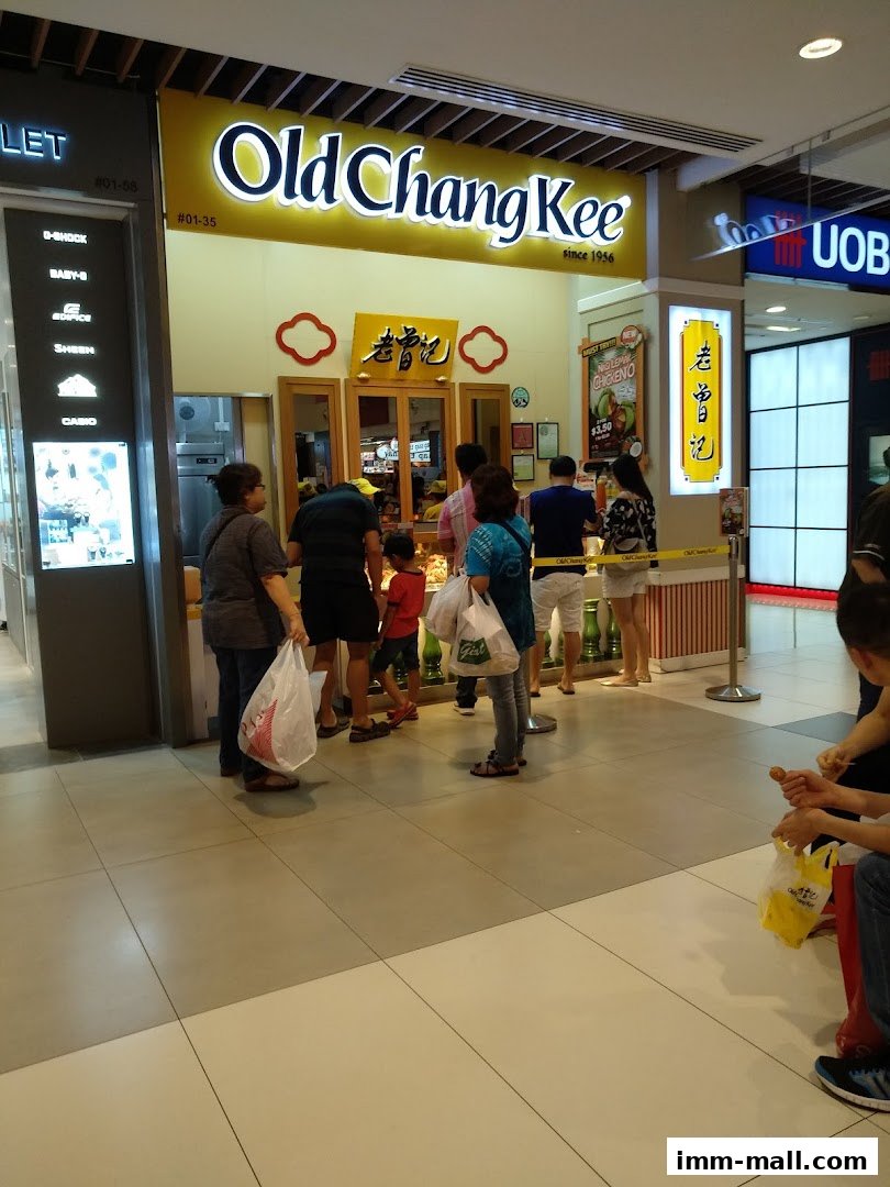 People queuing at the Old Chang Kee shop, a popular snack and food outlet.