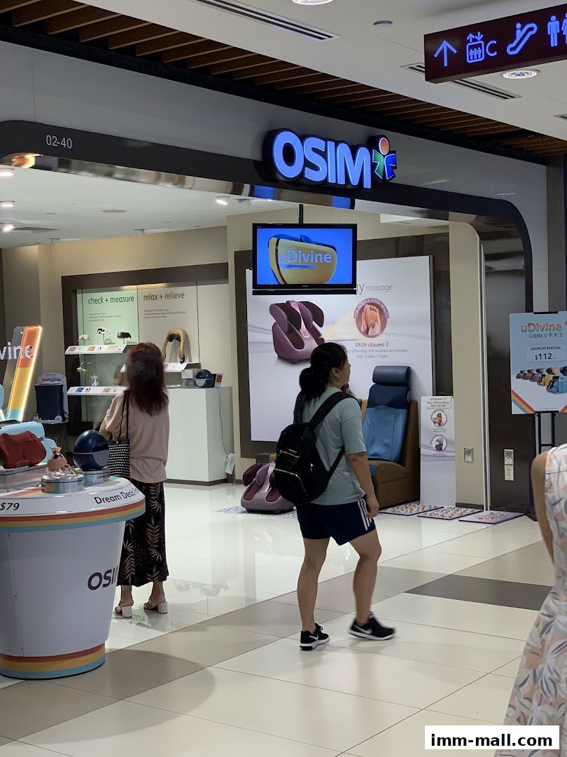 The OSIM shop displays massage chairs and wellness products with promotional signage.