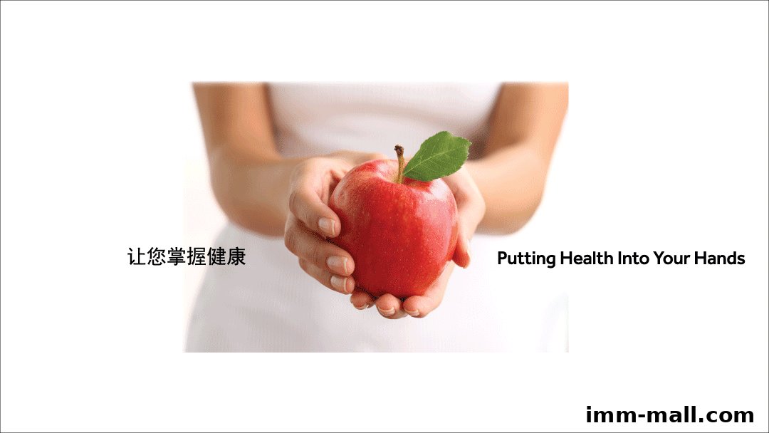 A person holds a red apple with a leaf, symbolizing health and wellness.