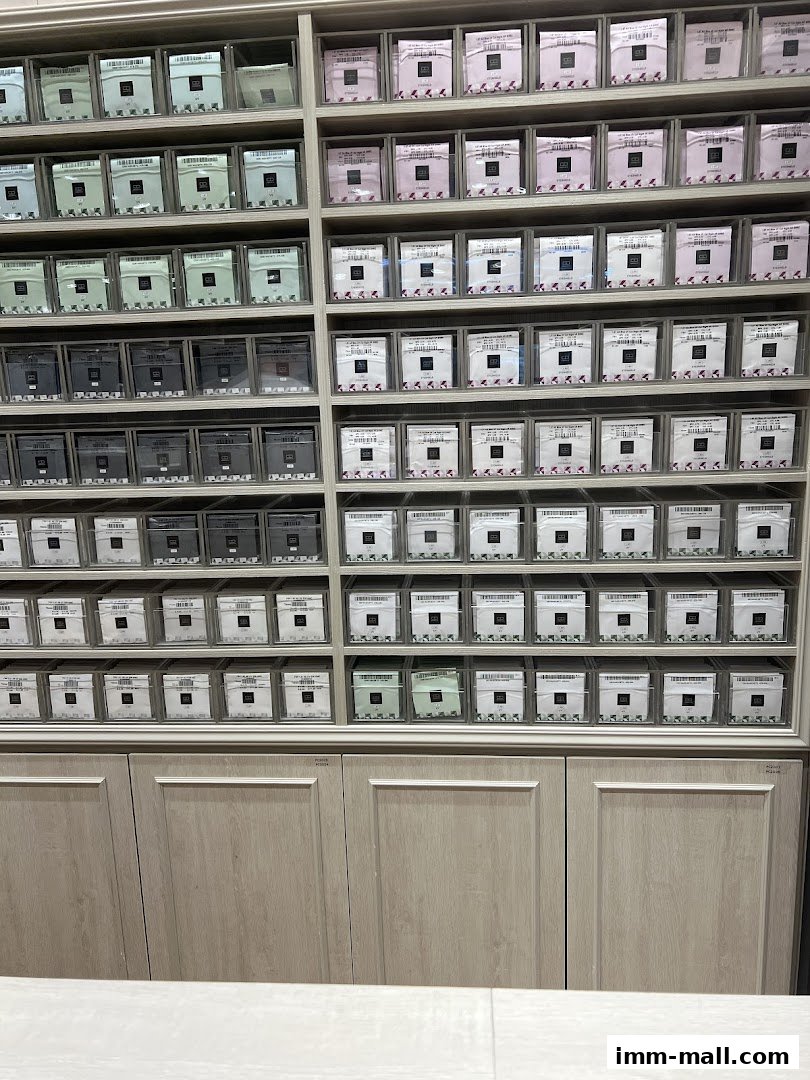 Shelves filled with neatly organized eyewear cases in various colors.