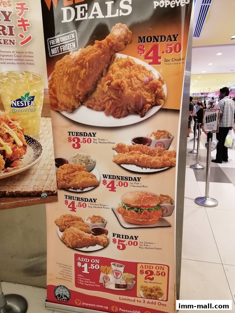 A promotional banner for Popeyes featuring weekly deals on fried chicken and other menu items.
