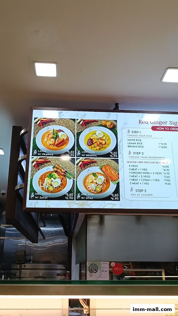 A menu board displaying four noodle dishes and ordering instructions for Red Ginger.