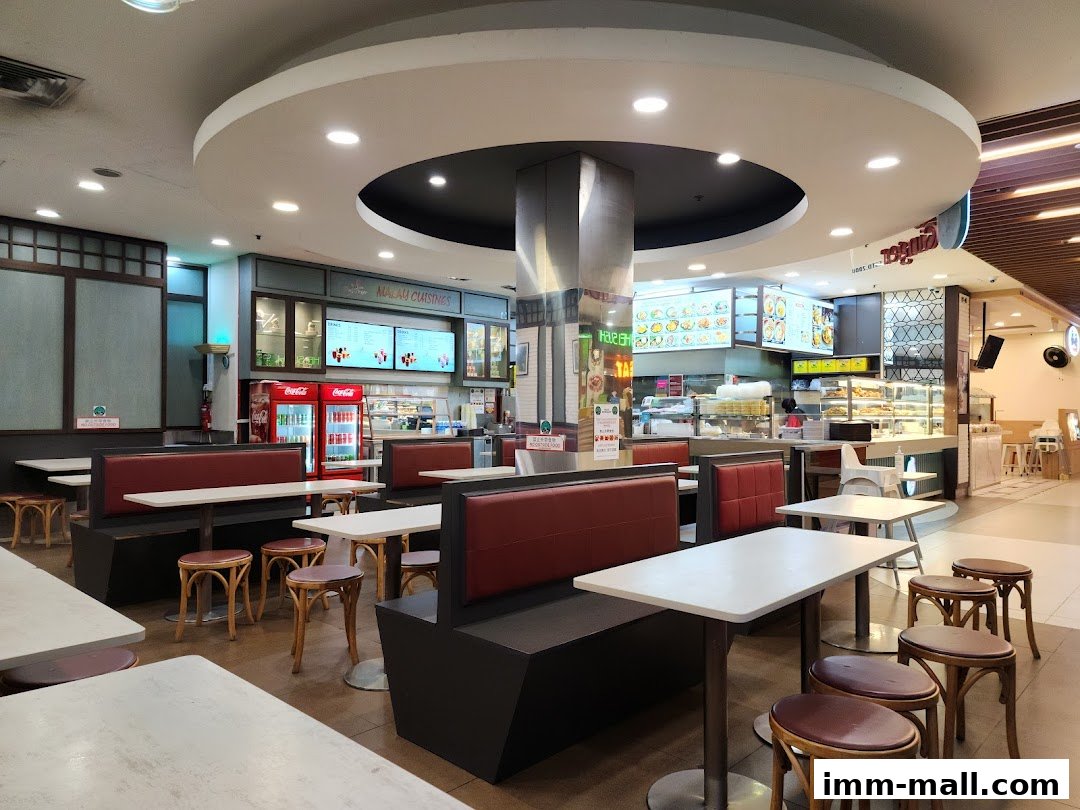 Interior view of a casual dining restaurant with booth seating and tables.