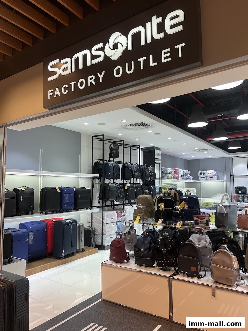 The entrance of a Samsonite Factory Outlet store showcasing a wide variety of luggage and bags.