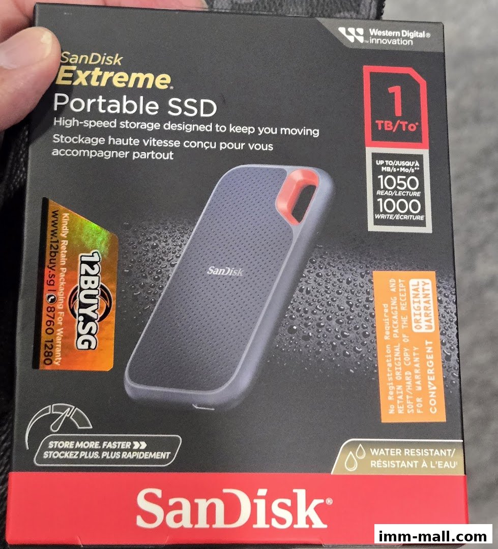 A SanDisk Extreme Portable SSD 1TB external hard drive in its retail packaging.