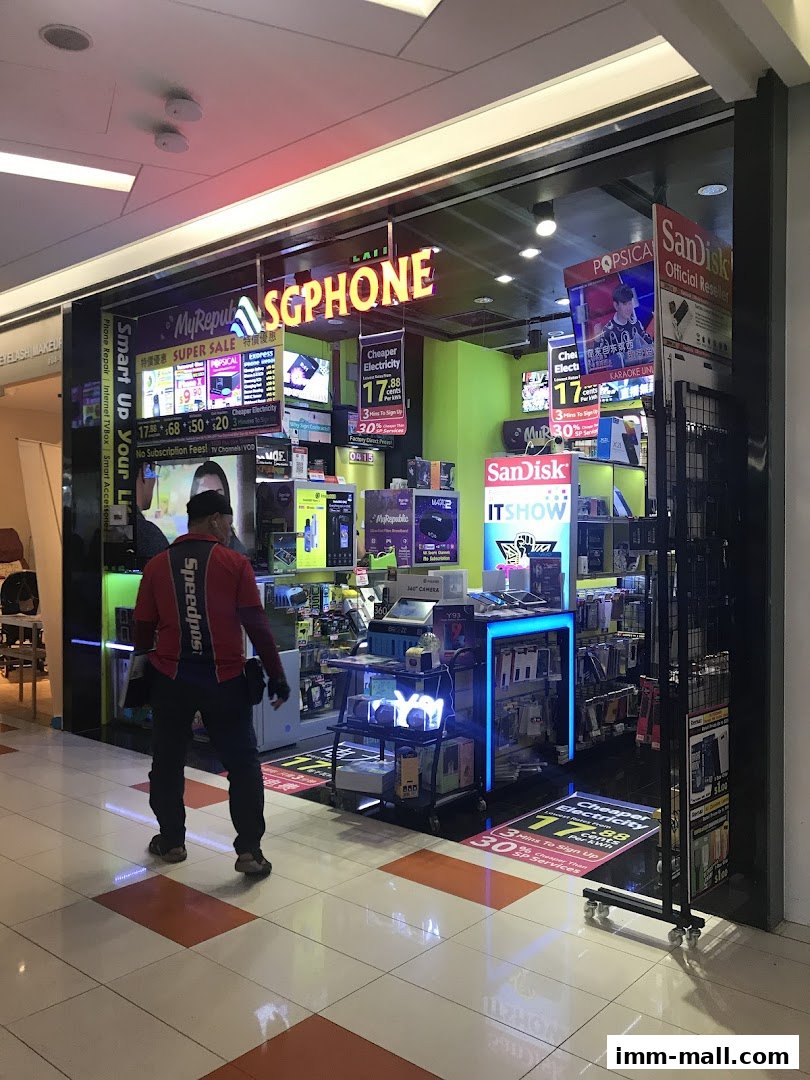 A brightly lit mobile phone and accessories shop with various products displayed.