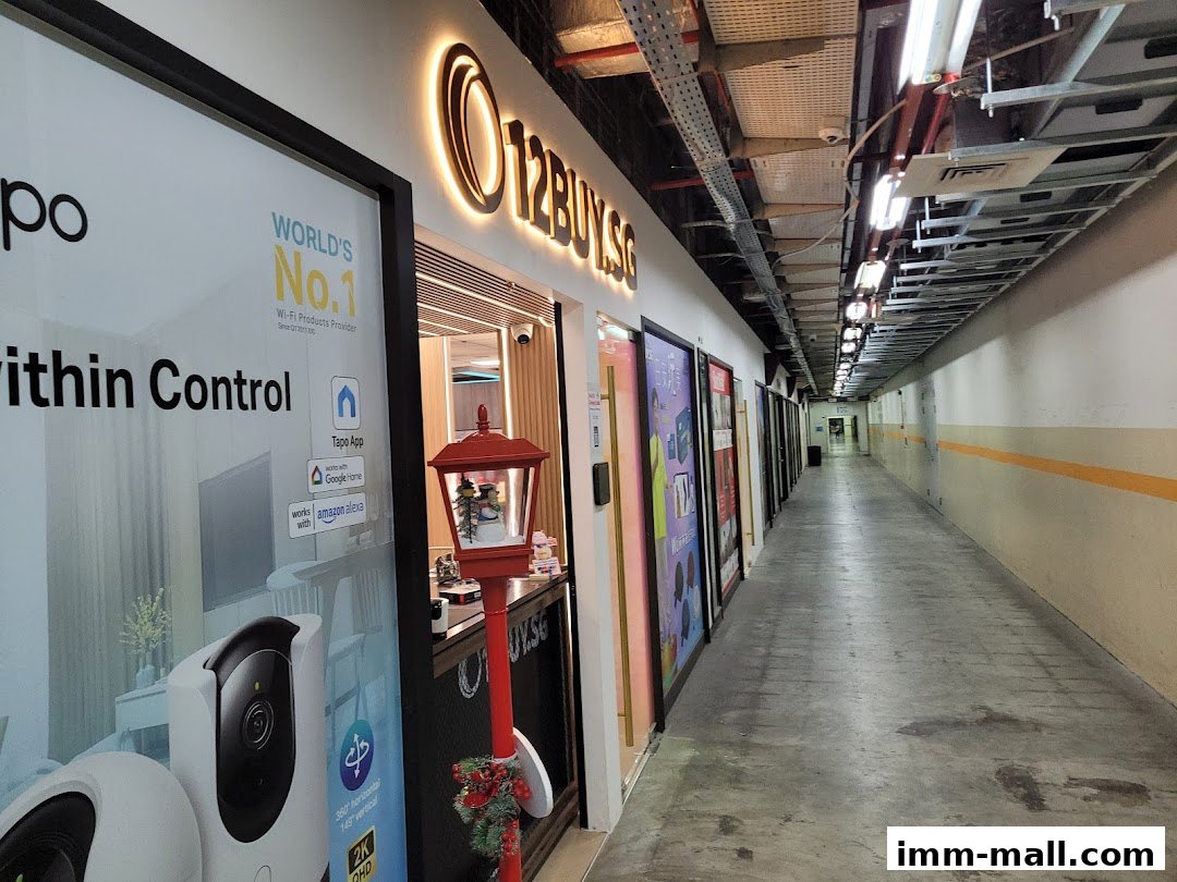 The storefront of 12BUY.SG, featuring a large advertisement for Wi-Fi products and a red decorative lamp.