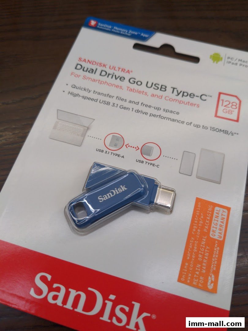 A SanDisk Ultra Dual Drive Go USB Type-C 128GB flash drive in its packaging.