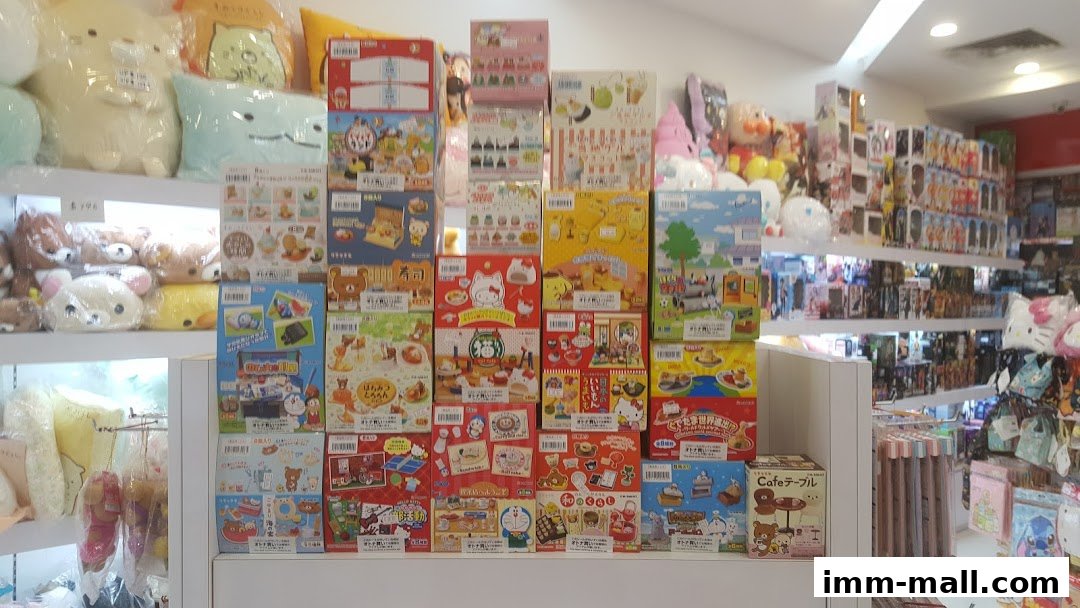 A retail shop interior filled with shelves of cute character-themed merchandise and plush toys.