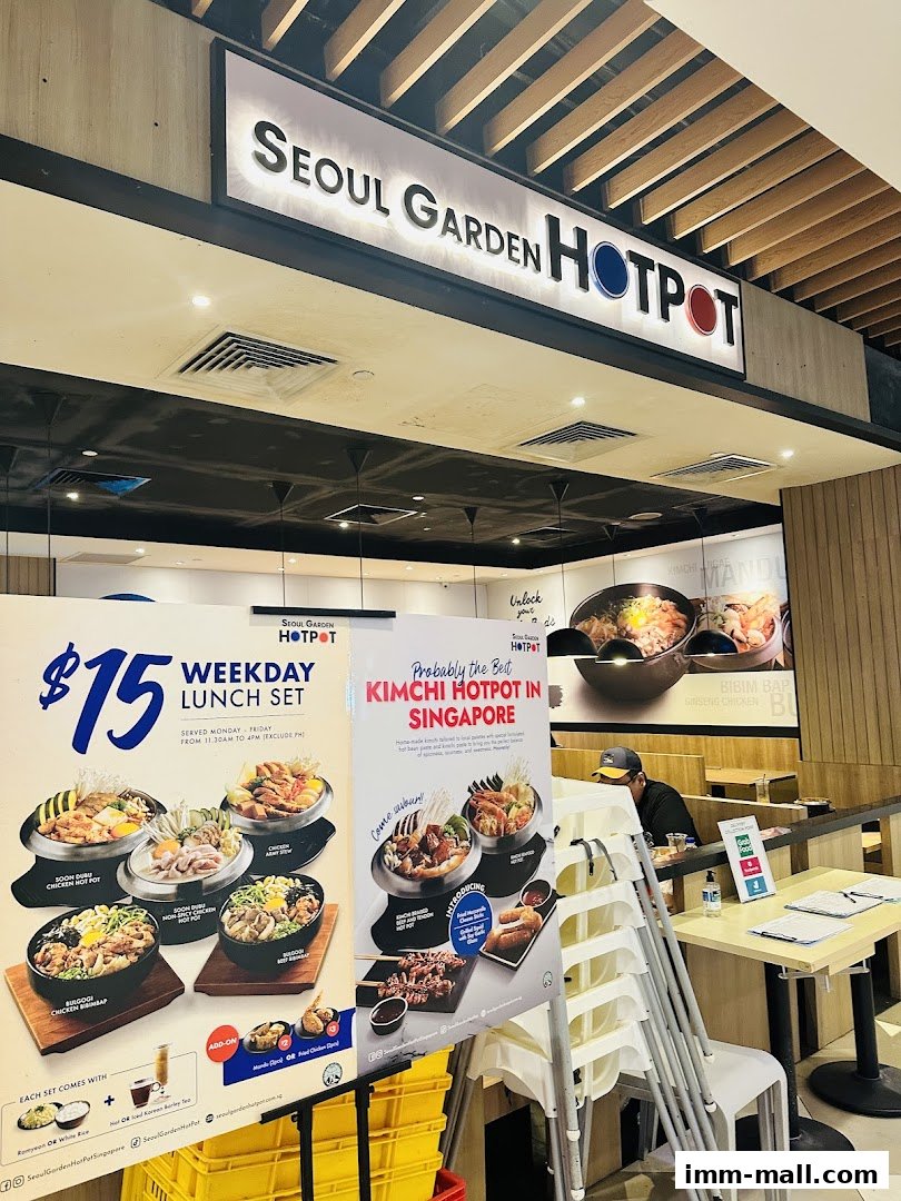 A sign advertising Seoul Garden Hotpot's $15 weekday lunch set and kimchi hotpot.