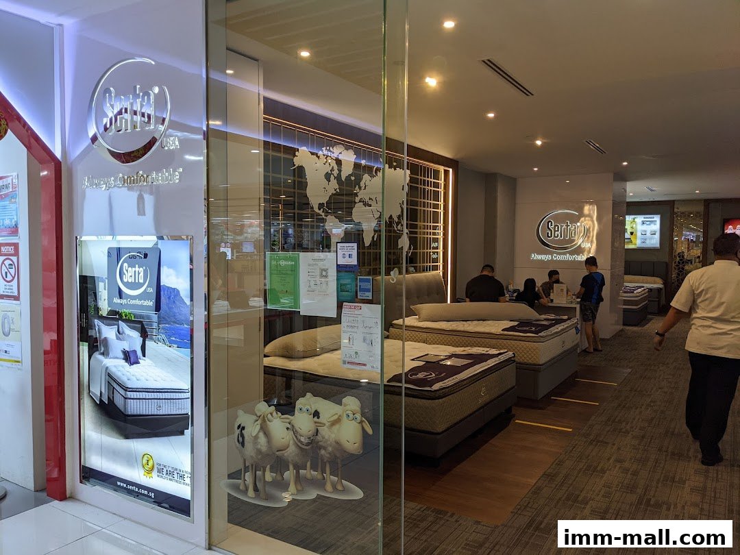 The Serta Sleep Center IMM shop front displays mattresses and the Serta logo with a world map backdrop.