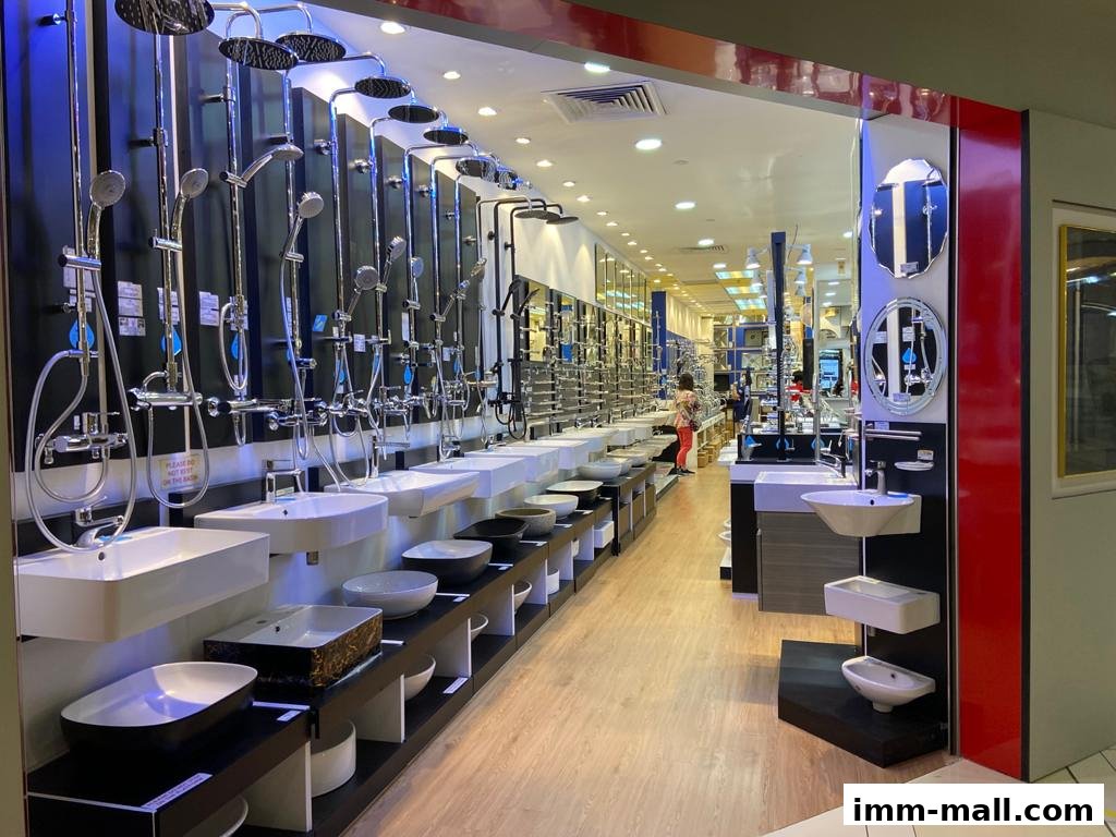 A well-lit store showcasing a wide selection of bathroom fixtures, including sinks and showerheads.