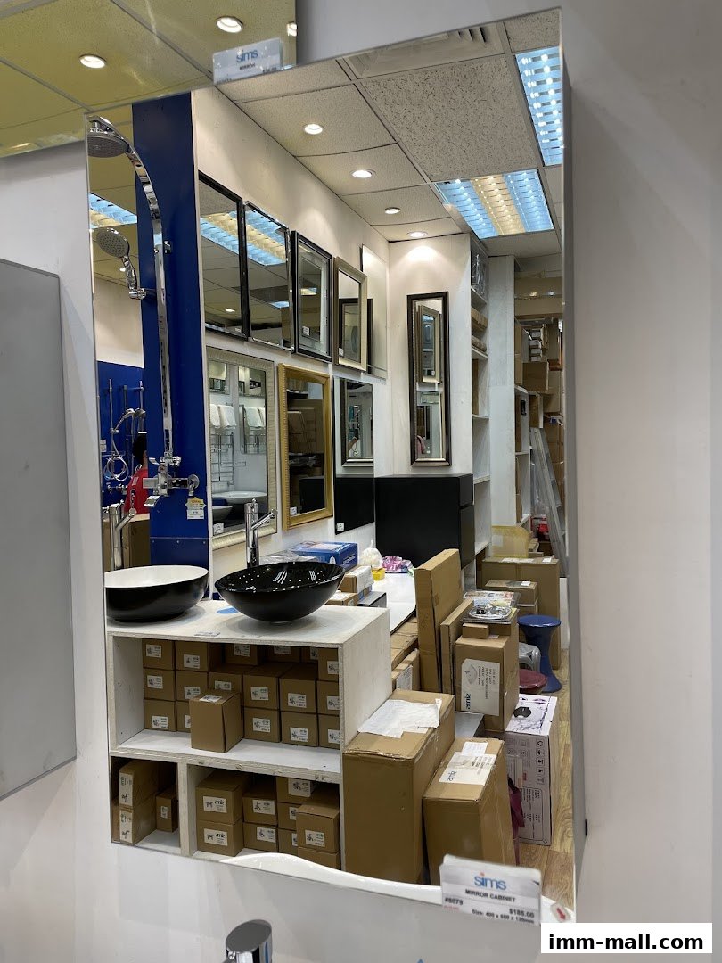 Interior view of a bathroom fixtures and mirrors store, showcasing various products and stock.
