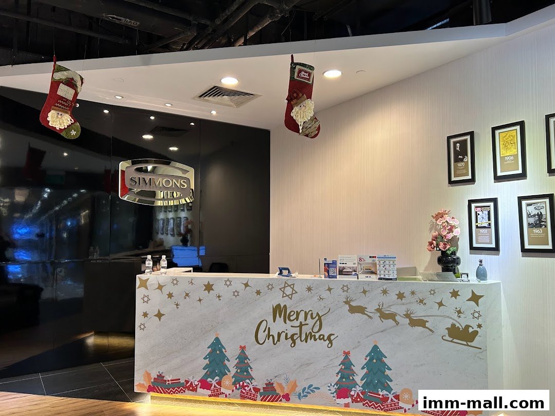 Simmons Gallery reception area decorated for Christmas with stockings and festive imagery.