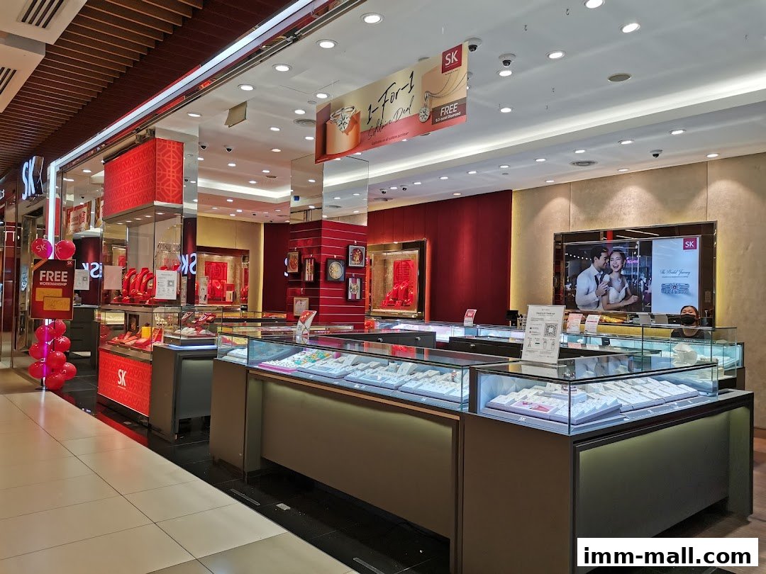 SK Jewellery store interior with display cases filled with jewelry and promotional signage.