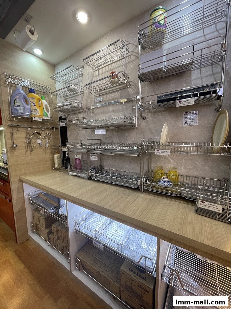 A well-organized display of stainless steel kitchen racks and dish drying solutions.