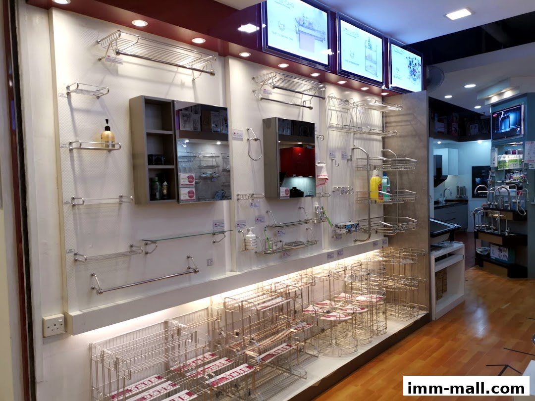 Interior view of a shop displaying various bathroom and kitchen accessories on shelves and racks.