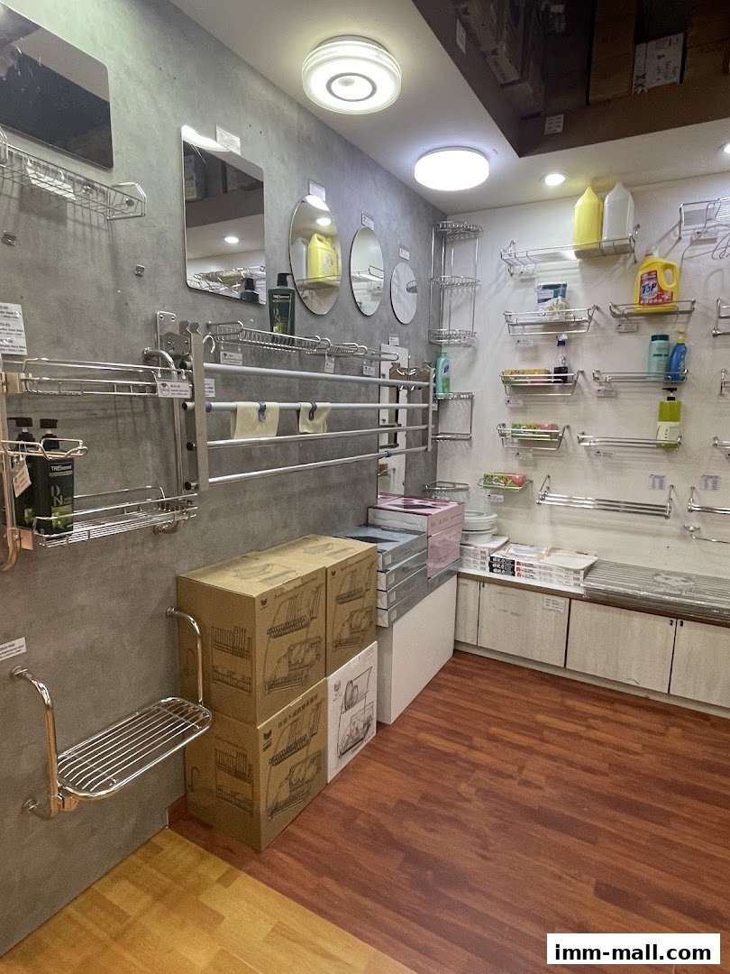 Interior view of a shop displaying various kitchen and bathroom storage solutions and cleaning supplies.