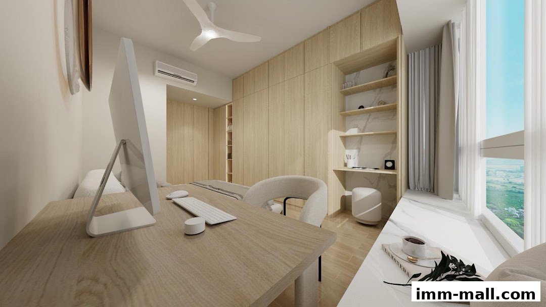 A modern bedroom with a desk, computer, and built-in wooden wardrobes.