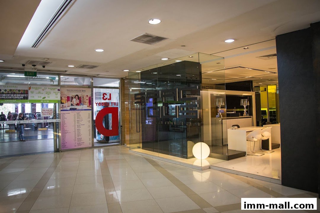 The entrance to Spacious Planners Pte. Ltd. with a seasonal salad bar buffet advertised.