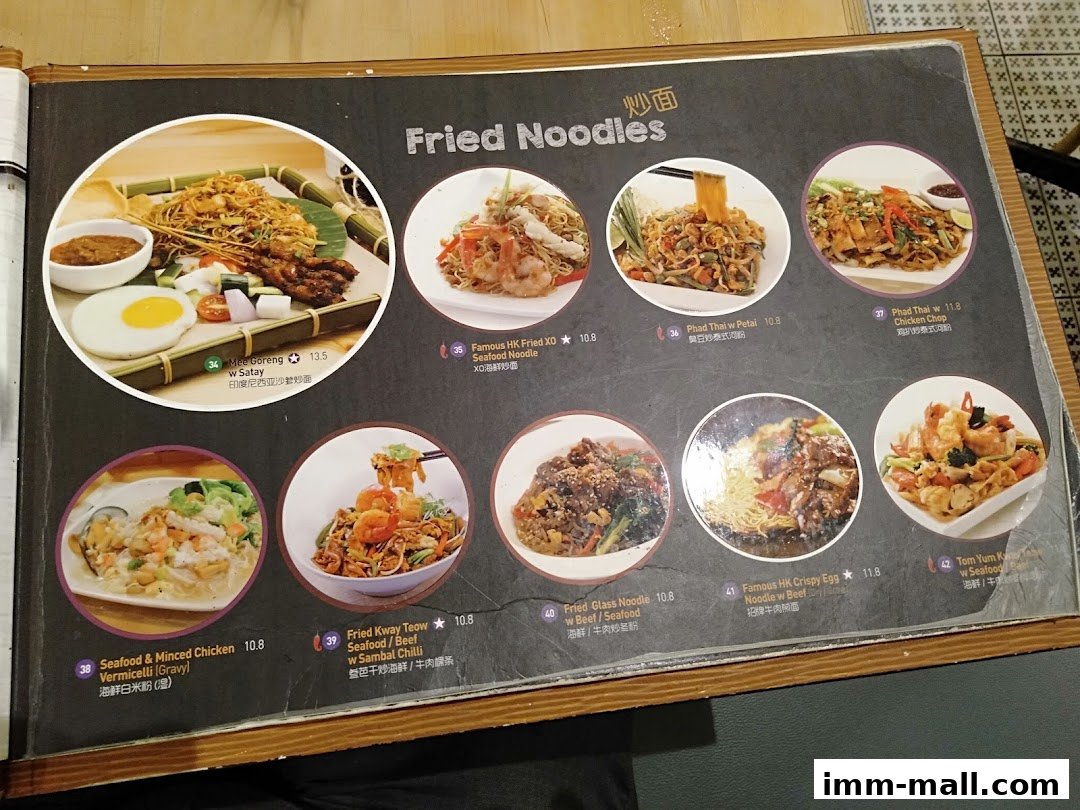 A menu page showcasing various fried noodle dishes with enticing images and descriptions.