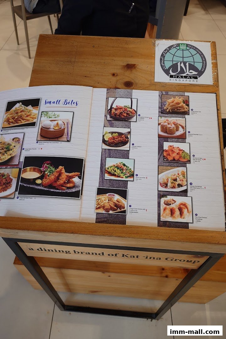 A menu from Streats IMM featuring various small bite dishes with images.