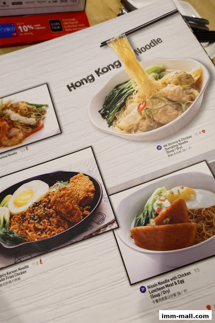 A menu featuring various noodle dishes with appetizing food photography.