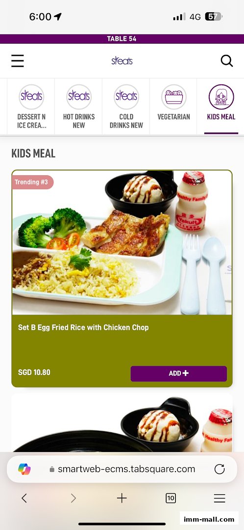 A kids meal set featuring fried rice, chicken chop, broccoli, tomatoes, ice cream, and a yogurt drink.