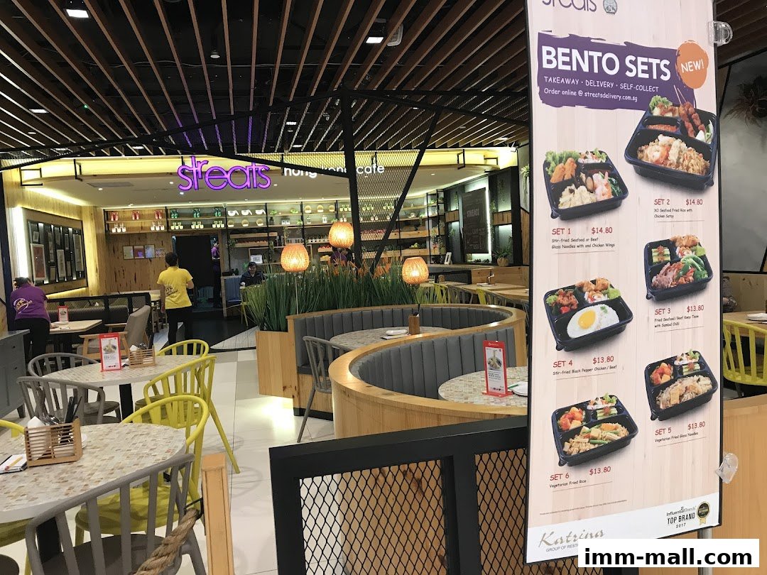 A menu board displays various bento sets offered by Streats restaurant.