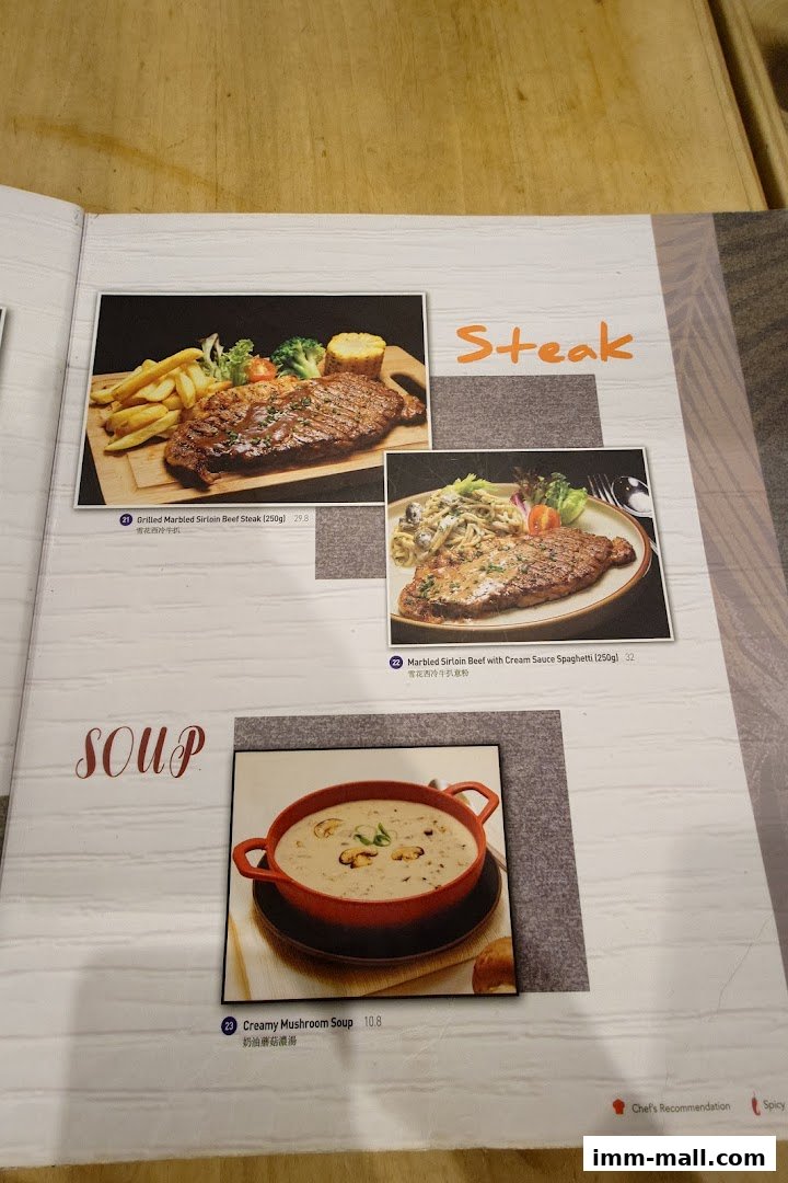 A menu page featuring steak and soup dishes with accompanying images and descriptions.