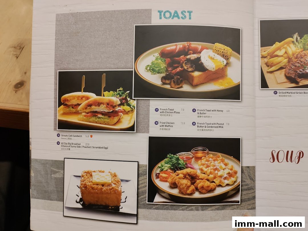 A menu page from Streats IMM featuring toast, sandwiches, and breakfast items.