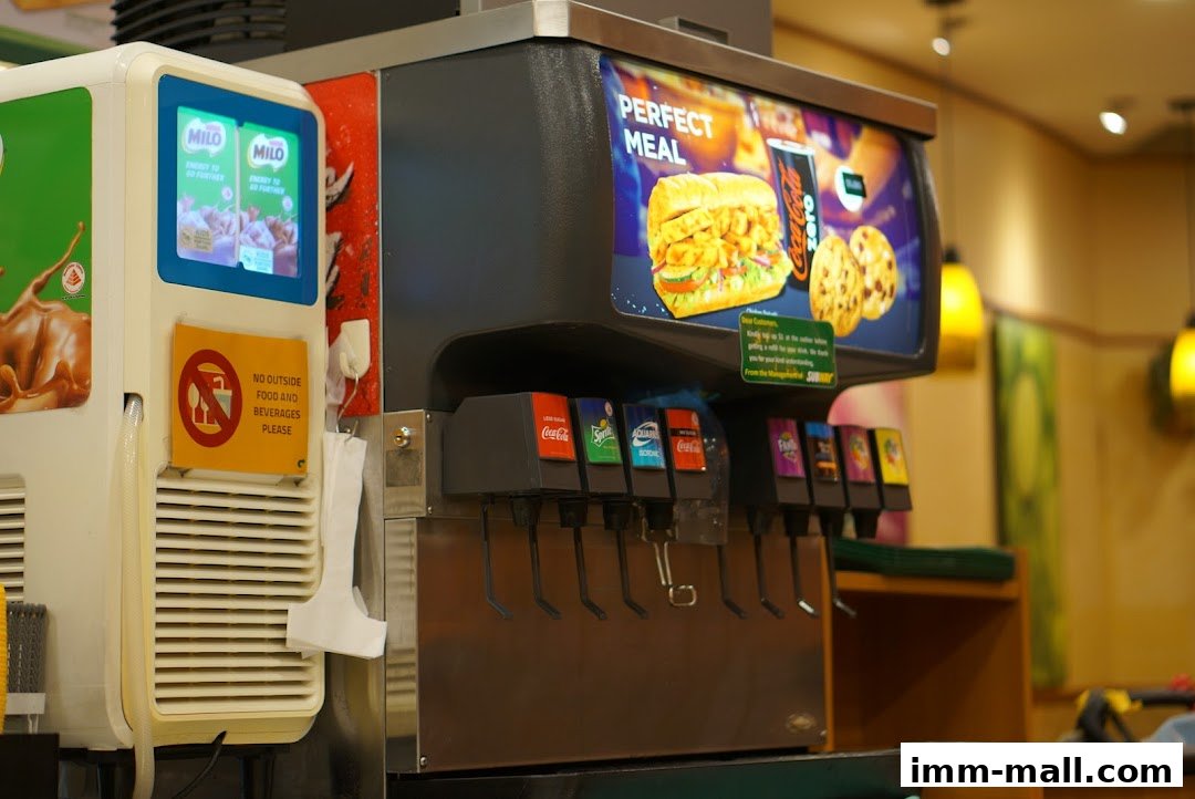 A Subway restaurant's beverage dispenser with various soda options and a 'Perfect Meal' advertisement.