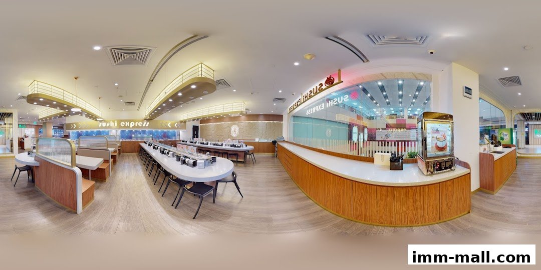 Interior view of Sushi Express with conveyor belt seating and dining areas.