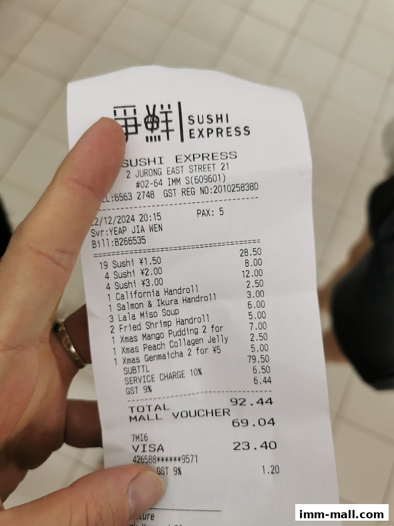 A receipt from Sushi Express showing a list of sushi and other items purchased.