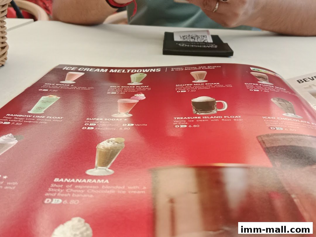 A menu from Swensens IMM featuring ice cream desserts and beverages.