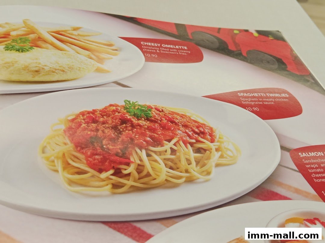 A menu featuring a cheesy omelette with fries and spaghetti twirlies.