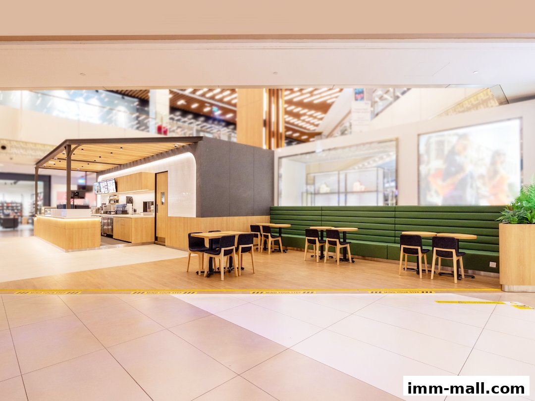 Interior view of The Coffee Bean Tea Leaf cafe with seating and counter.