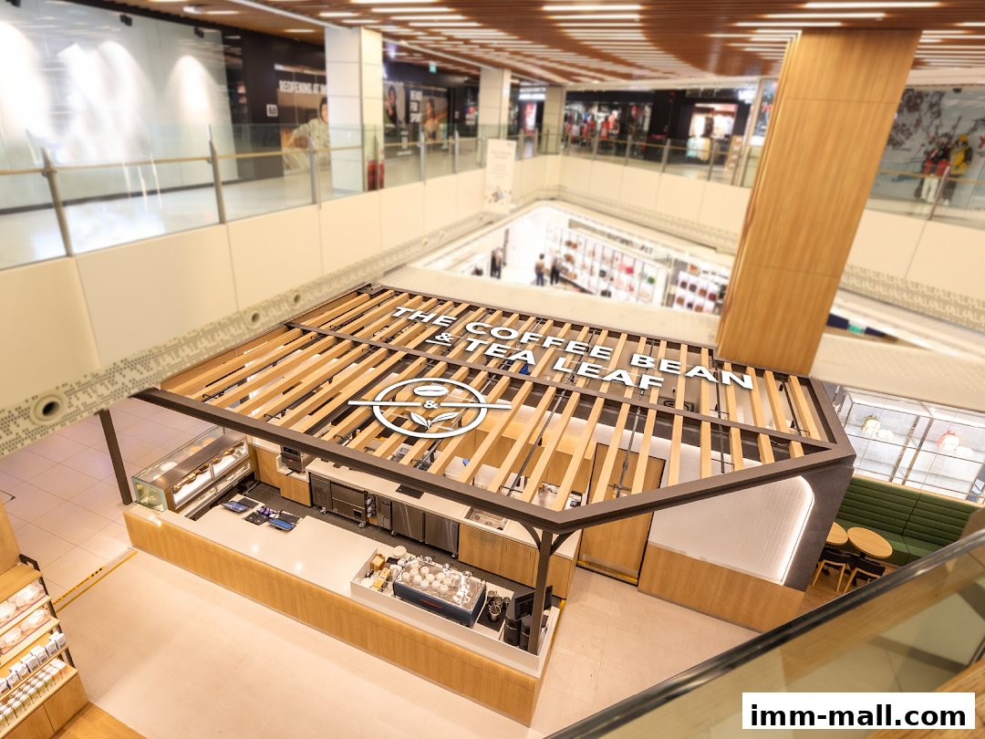 An aerial view of The Coffee Bean & Tea Leaf shop in a modern shopping mall.