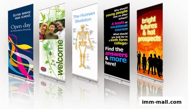 A display of five roll-up banners advertising educational opportunities and events.